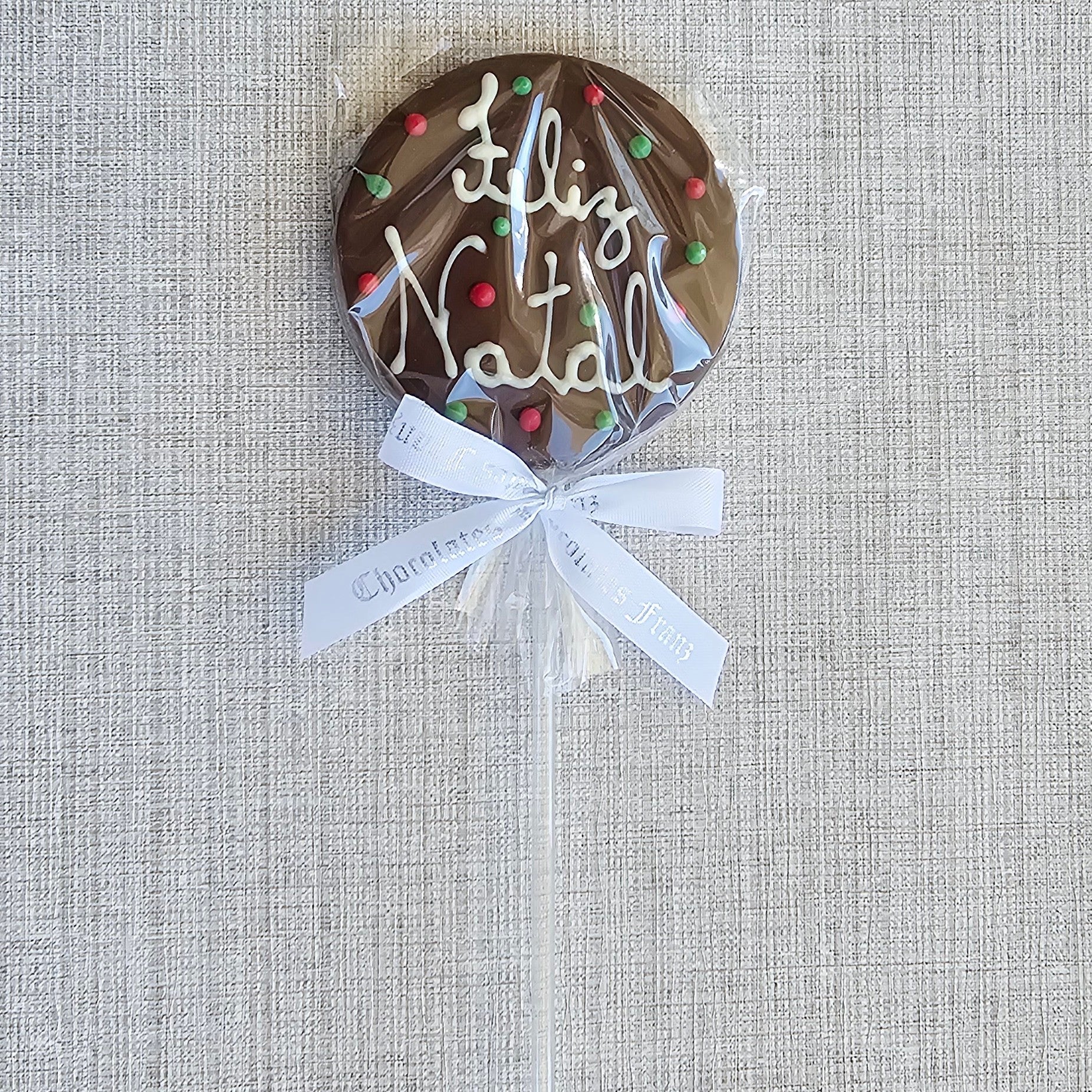Pirulito natal chocolate ao leite colorido 30g