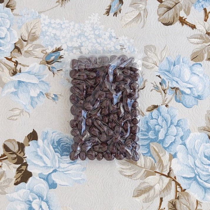 Confeitos de Passas em chocolate meio amargo 250g